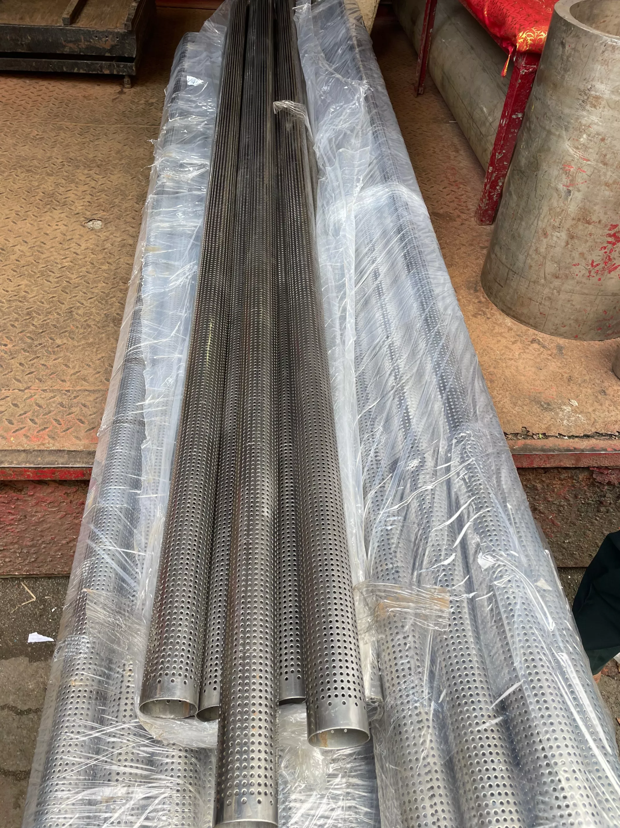 Stainless steel perforated pipe stock and packing at Kamal Steels